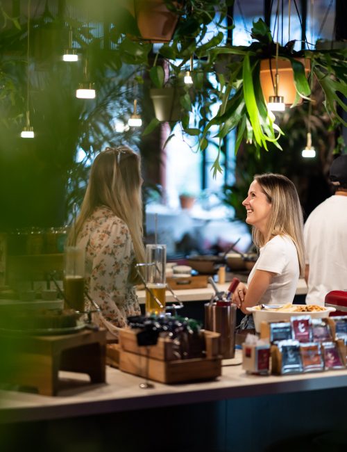 people laughing at Indoor garden brunch buffet